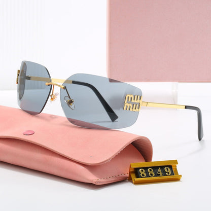 Lunettes de Soleil MIU MIU 54YS