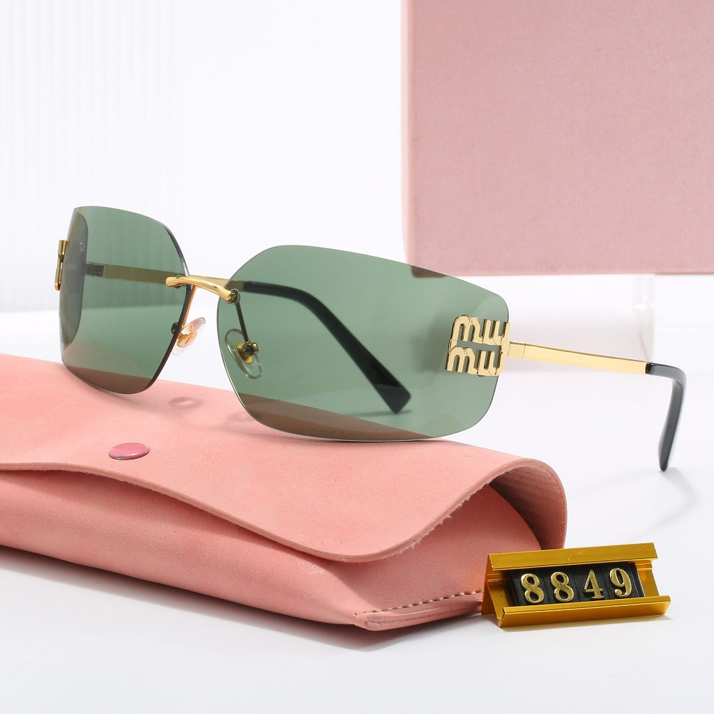 Lunettes de Soleil MIU MIU 54YS