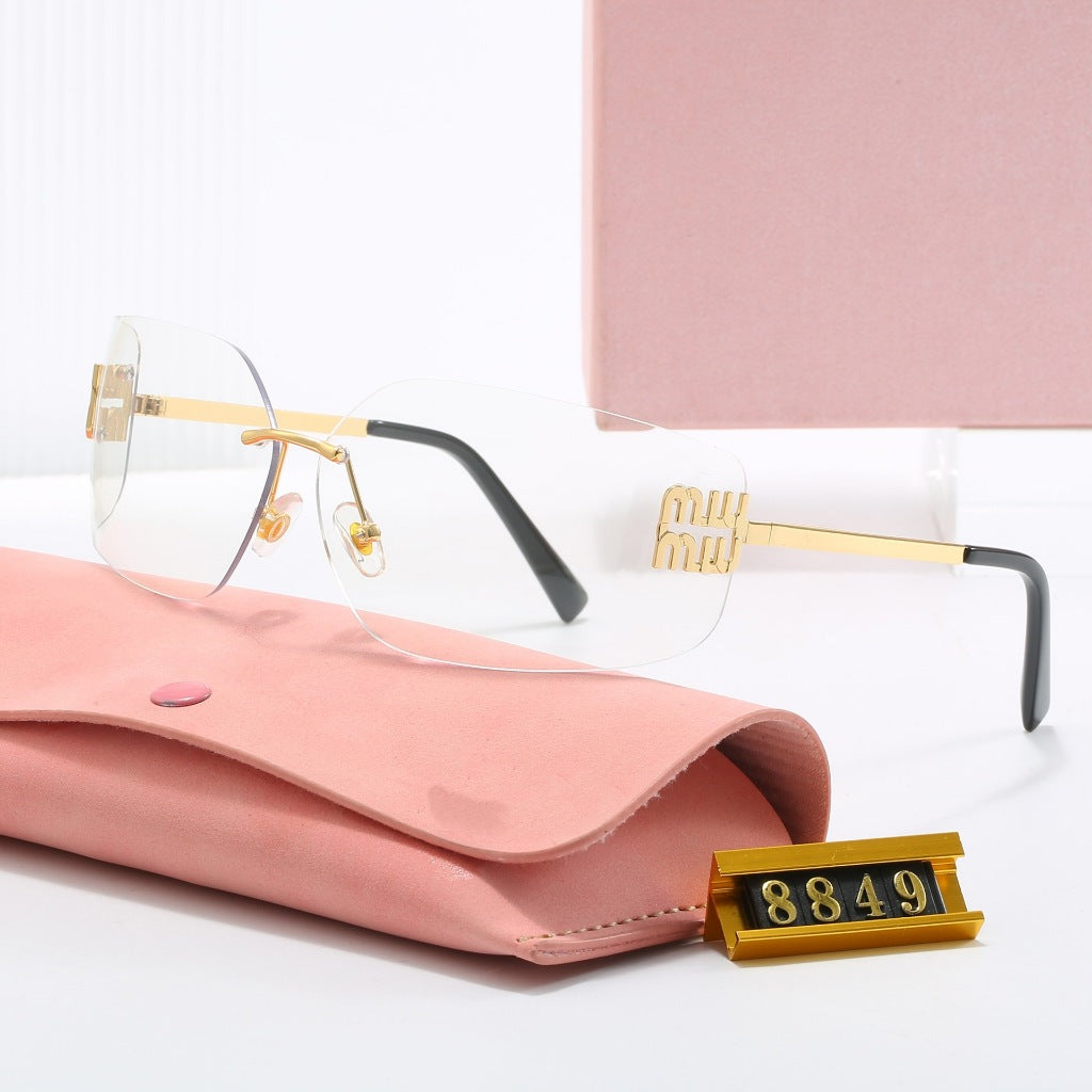 Lunettes de Soleil MIU MIU 54YS