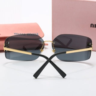 Lunettes de Soleil MIU MIU 54YS